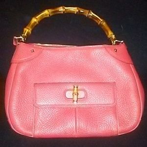 Red leather Gucci bag with wooden handel